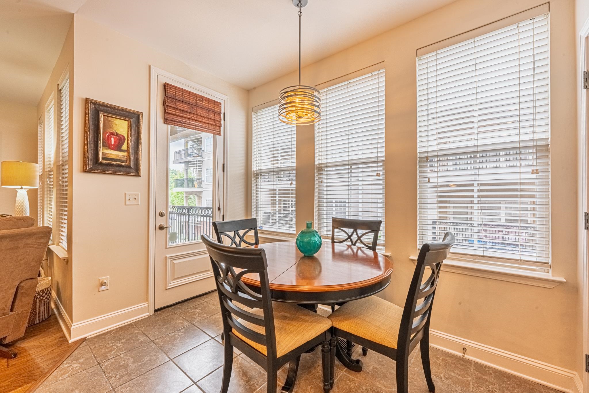 75 Shoemaker Court, Unit 105 Memphis, TN 38103 - Photo 9 of 25 a dining room with furniture and window
