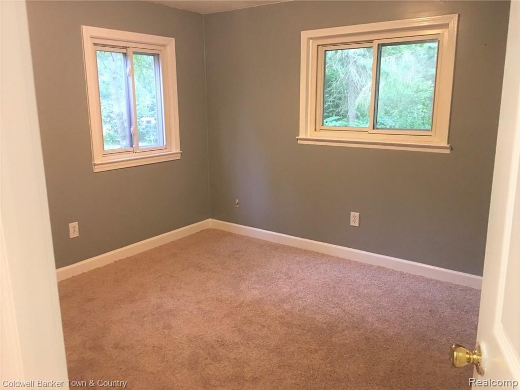 223 Ruppert Street Commerce Township, MI 48382 - Photo 22 of 31 Master bedroom - empty.
