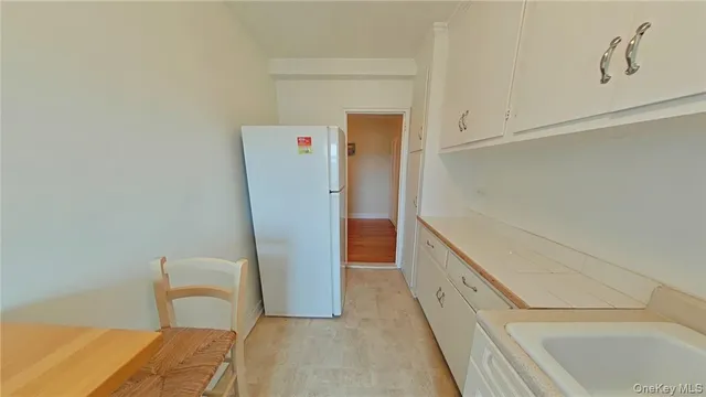 a kitchen that has a stove and a microwave
