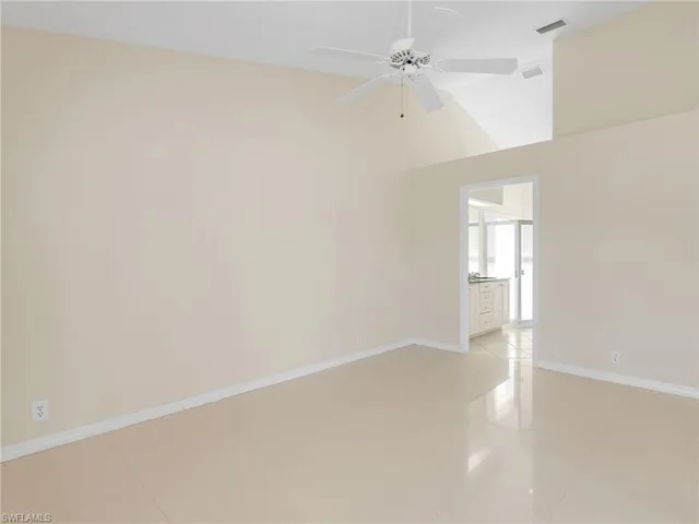 a bedroom with bed and a window