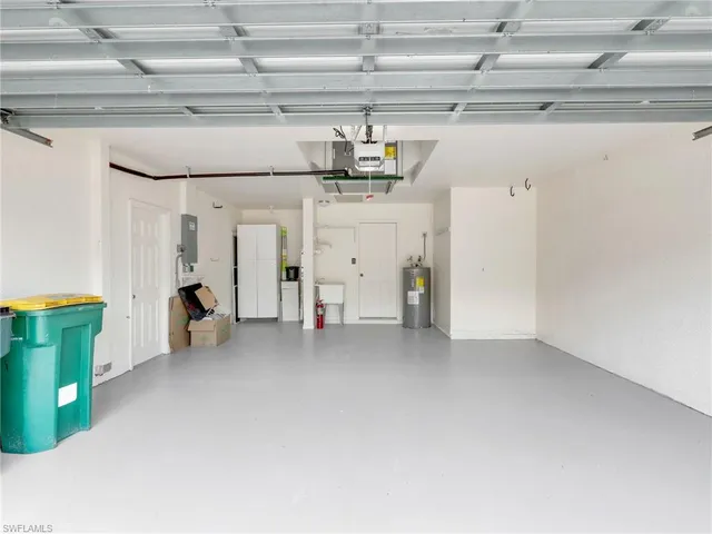 an aerial view of a house with a lake view