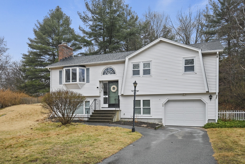 14 Town Line Road Burlington, MA 01803 - Photo 2 of 31 a view of a house with a yard and large tree