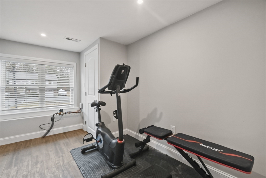 14 Town Line Road Burlington, MA 01803 - Photo 28 of 31 a view of a room with gym equipment