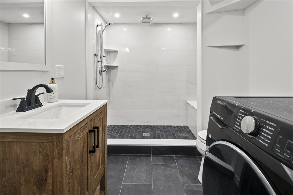 14 Town Line Road Burlington, MA 01803 - Photo 29 of 31 a kitchen that has a sink and a stove