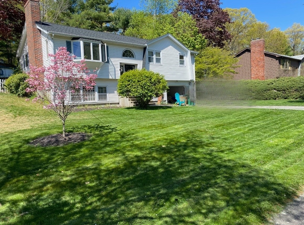 14 Town Line Road Burlington, MA 01803 - Photo 4 of 31 a front view of house with yard and green space