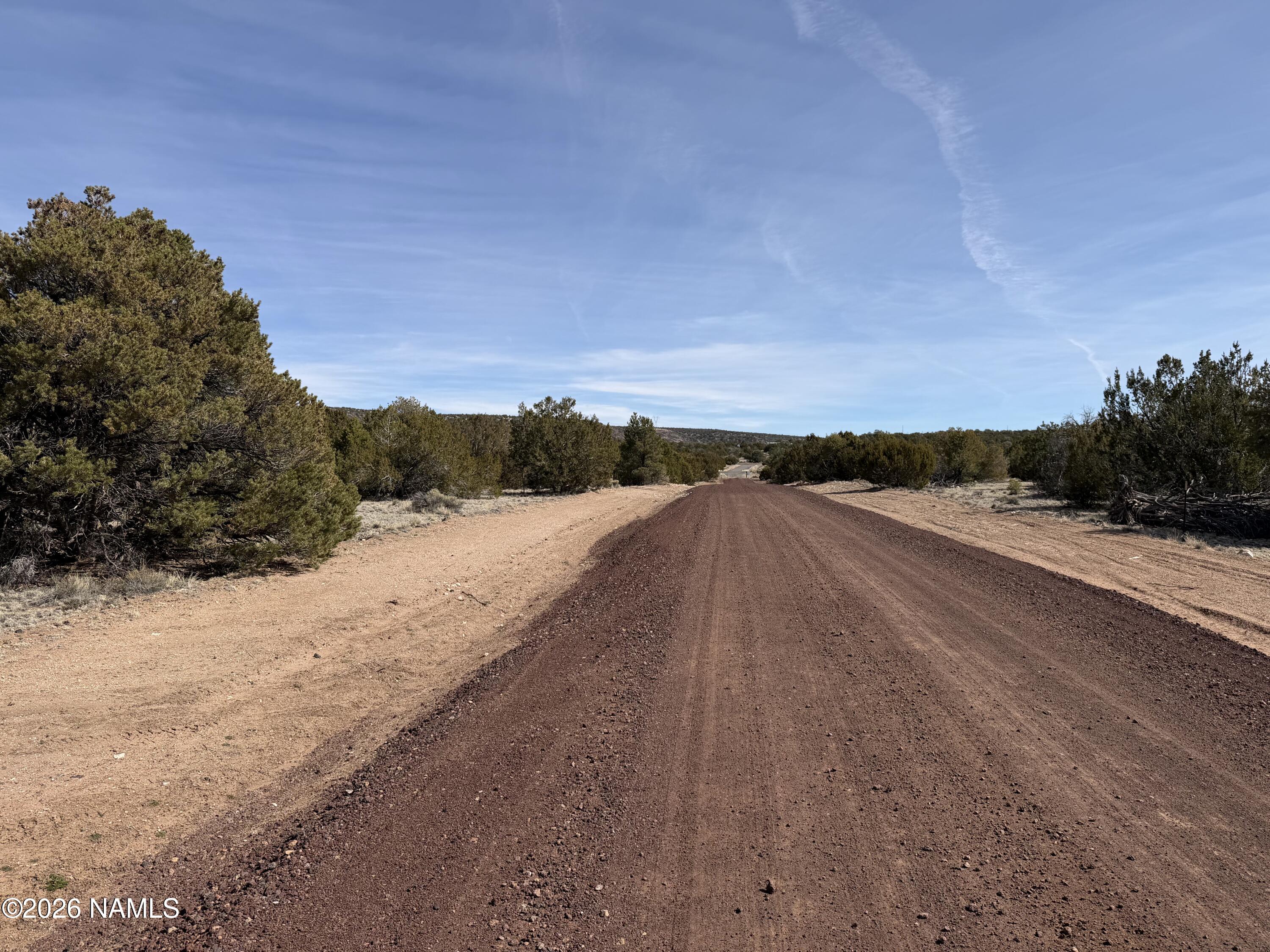 13537 Bly Station Road, Unit C Williams, AZ 86046 - Photo 8 of 8 a view of a road with a beach