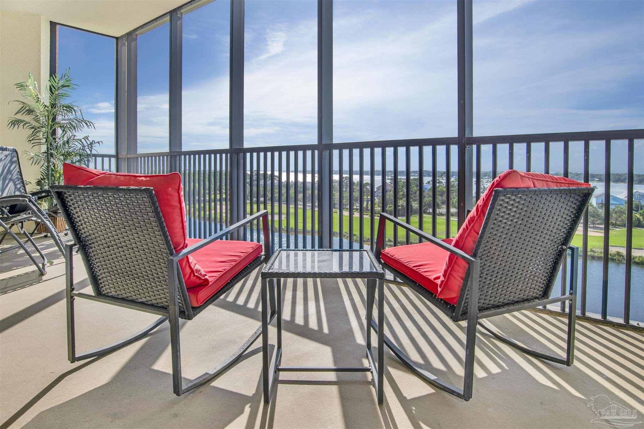 645 Lost Key Drive, Unit 704 Perdido Key, FL 32507 - Photo 2 of 31 a view of a balcony with furniture