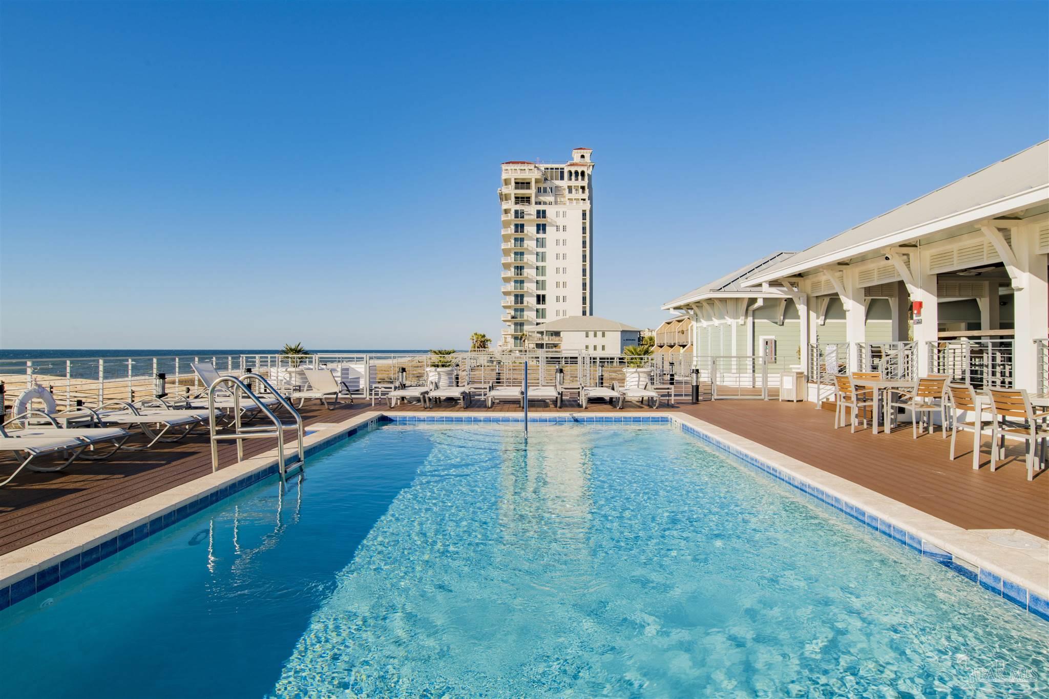 645 Lost Key Drive, Unit 704 Perdido Key, FL 32507 - Photo 29 of 31 a view of a swimming pool with outdoor seating