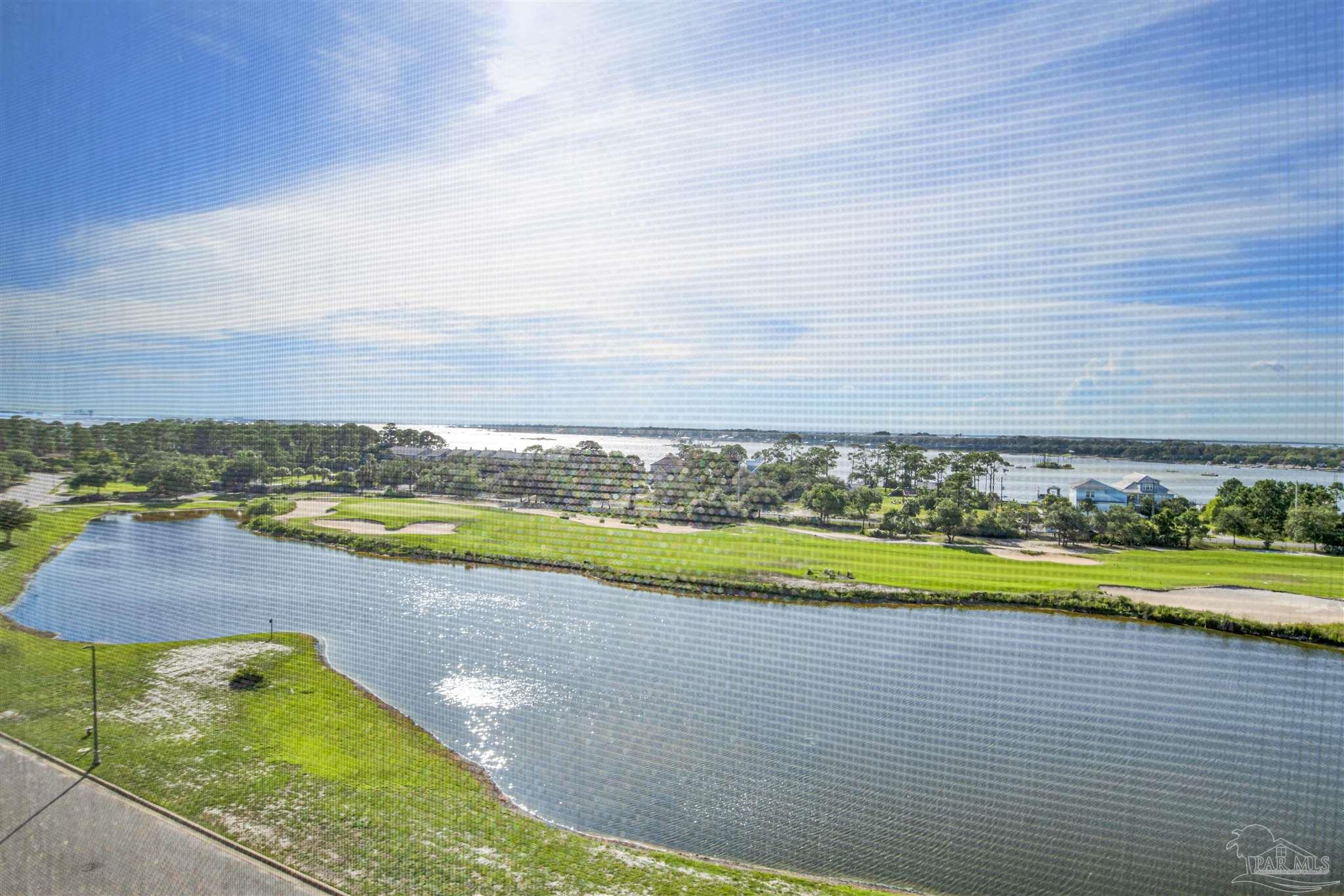 645 Lost Key Drive, Unit 704 Perdido Key, FL 32507 - Photo 5 of 31 a view of a swimming pool and an outdoor space
