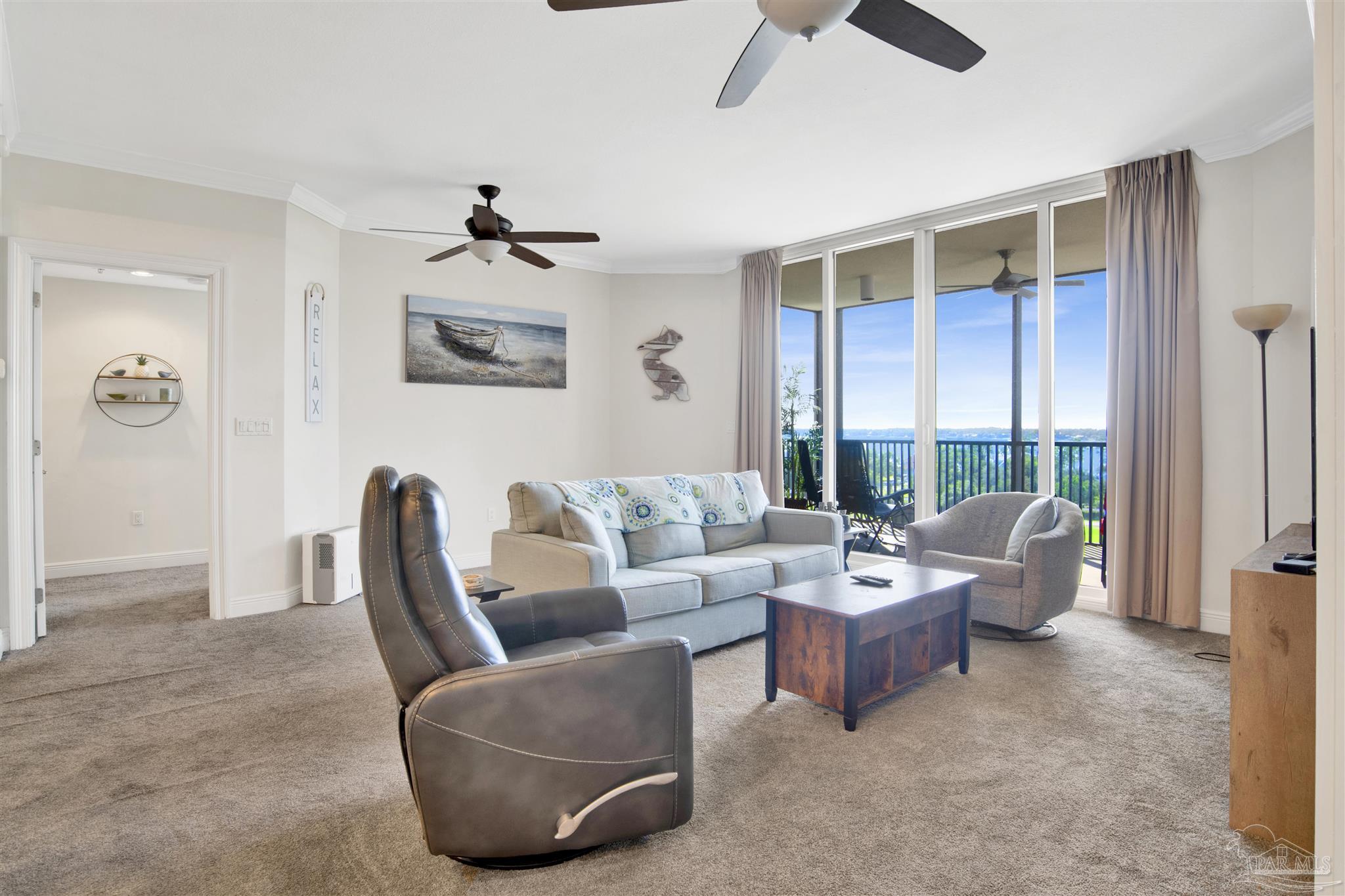 645 Lost Key Drive, Unit 704 Perdido Key, FL 32507 - Photo 6 of 31 a living room with furniture and a window