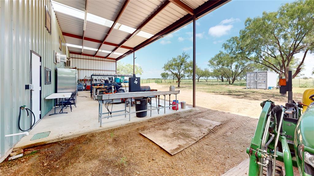 419 Rochelle Tx 76872 Brady, TX 76825 - Photo 5 of 34 a view of a patio with a table and chairs