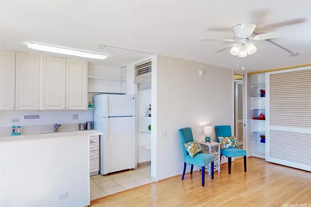 a view of kitchen with cabinets and stainless steel appliances