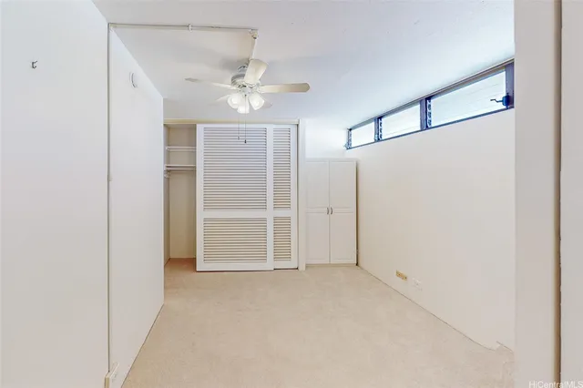 a view of a room that has a window in it