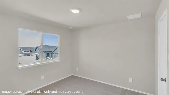 a room with a sink and a mirror