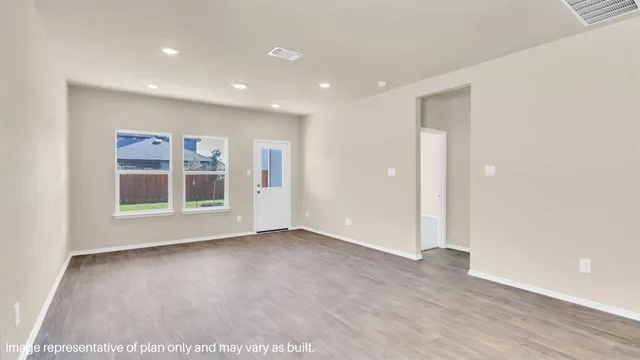 a view of livingroom with hardwood floor and window