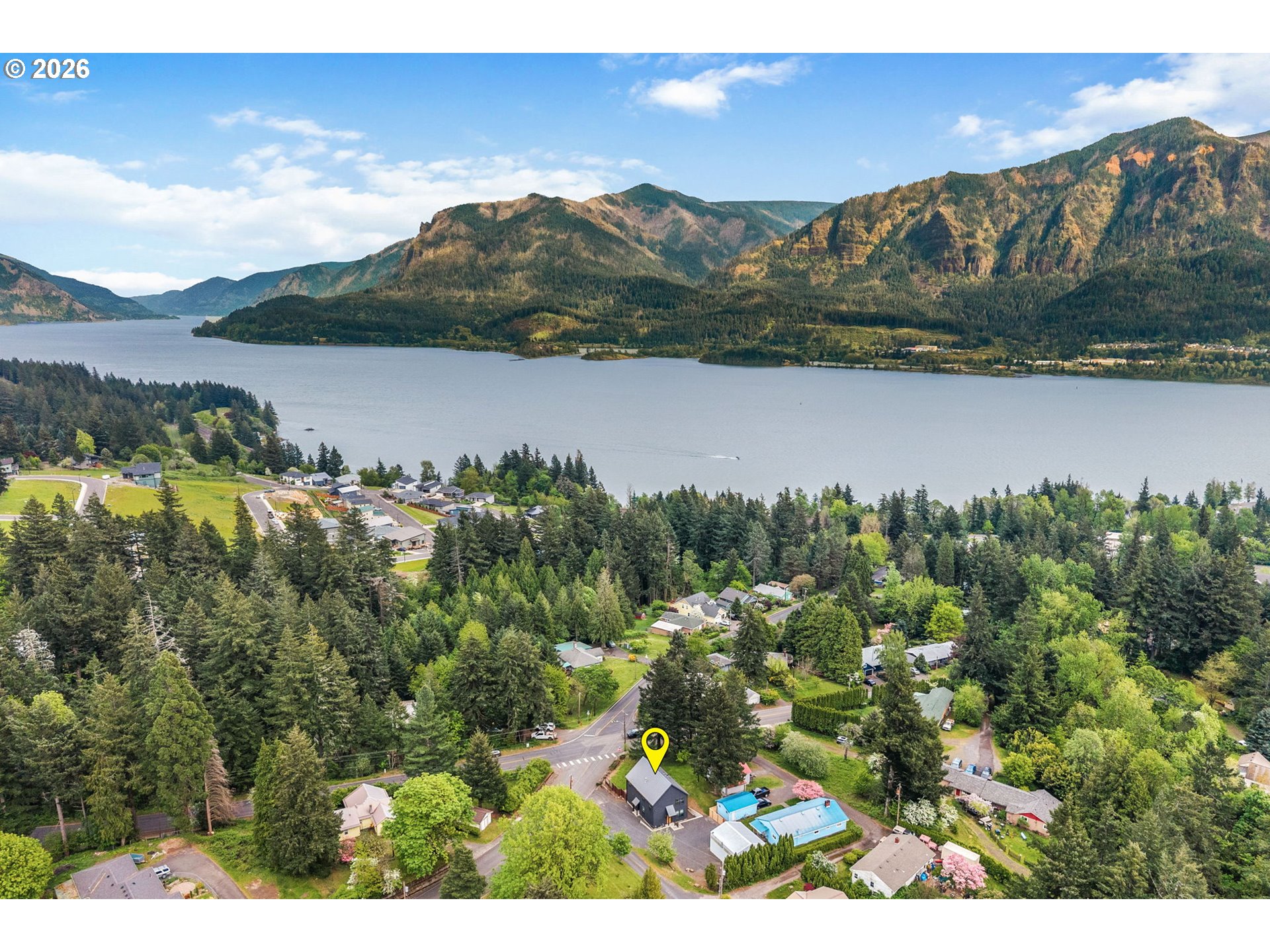 361 Frank Johns Road Stevenson, WA 98648 - Photo 2 of 27 a view of a lake with a mountain in the background