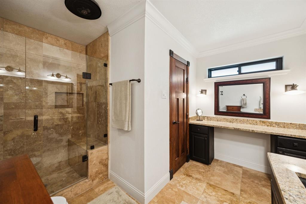 14380 Olympic Drive Farmers Branch, TX 75234 - Photo 18 of 33 a bathroom with a sink and a mirror