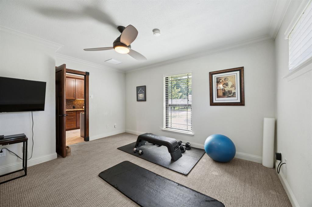 14380 Olympic Drive Farmers Branch, TX 75234 - Photo 24 of 33 a living room with furniture and a flat screen tv