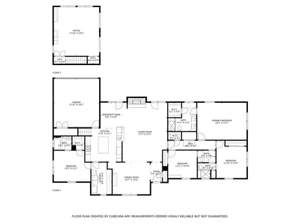 an aerial view of a golf course with a lake view