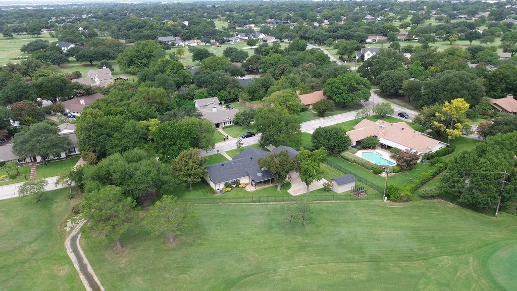 14380 Olympic Drive Farmers Branch, TX 75234 - Photo 32 of 33 an aerial view of residential houses with outdoor space and trees