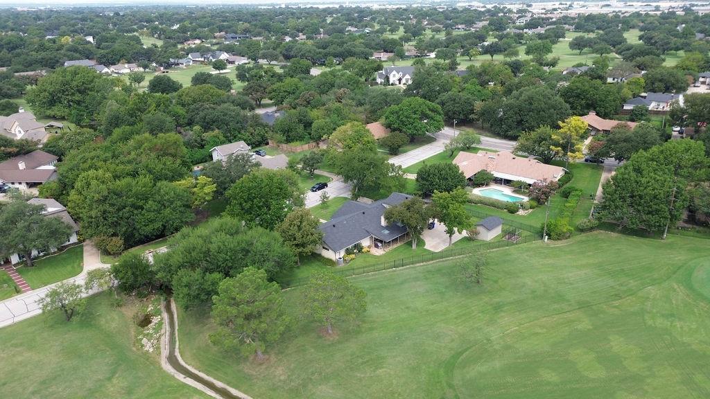 14380 Olympic Drive Farmers Branch, TX 75234 - Photo 4 of 33 an aerial view of residential houses with outdoor space and trees
