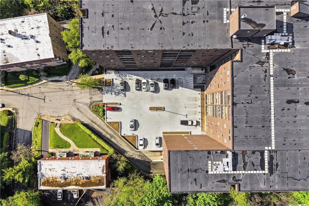 5600 Munhall Road, Unit 309 Pittsburgh, PA 15217 - Photo 39 of 40 a view of a building with a outdoor space