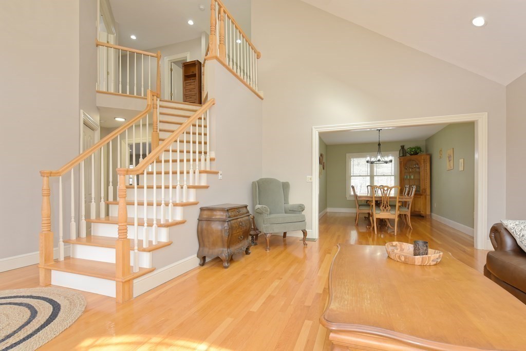 125 Brookside Drive Uxbridge, MA 01569 - Photo 21 of 40 a view of a livingroom with furniture and a fireplace