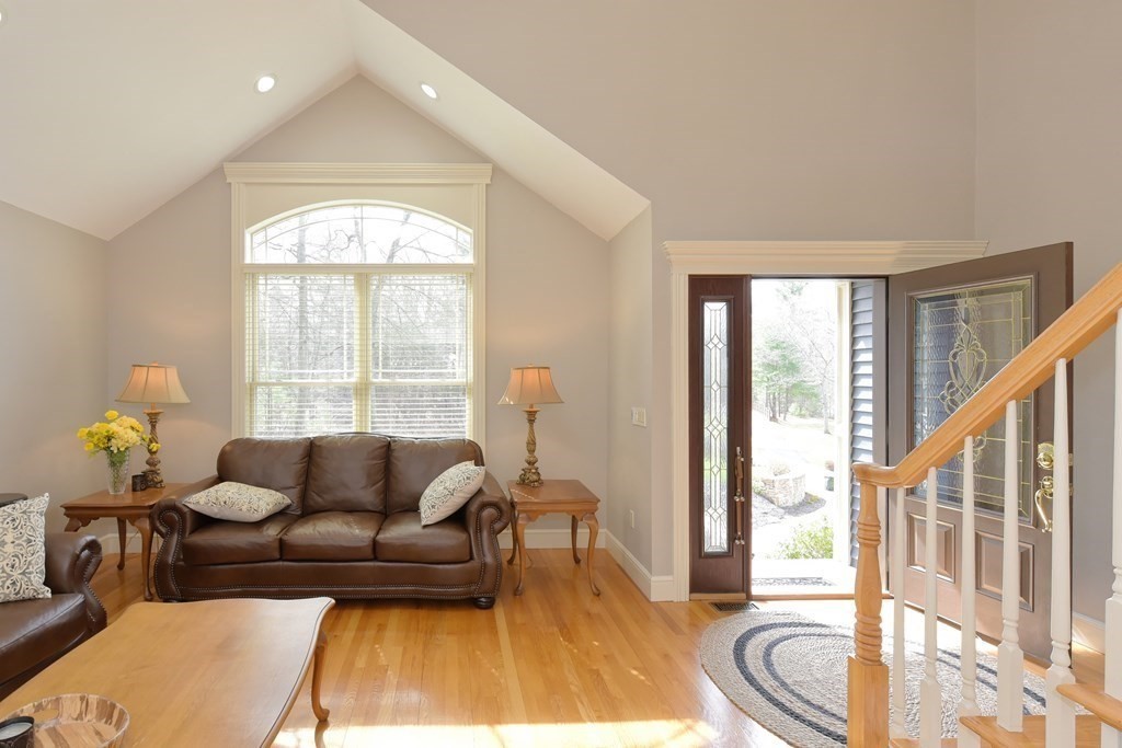 125 Brookside Drive Uxbridge, MA 01569 - Photo 22 of 40 a living room with furniture and a large window