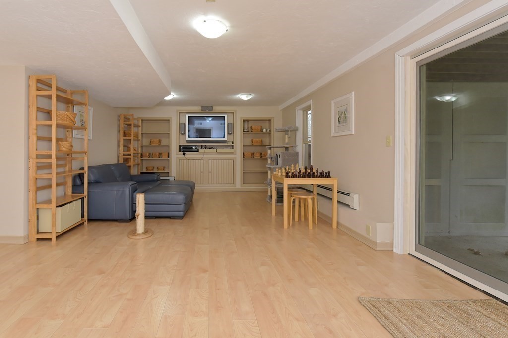 125 Brookside Drive Uxbridge, MA 01569 - Photo 31 of 40 a living room with furniture and a piano