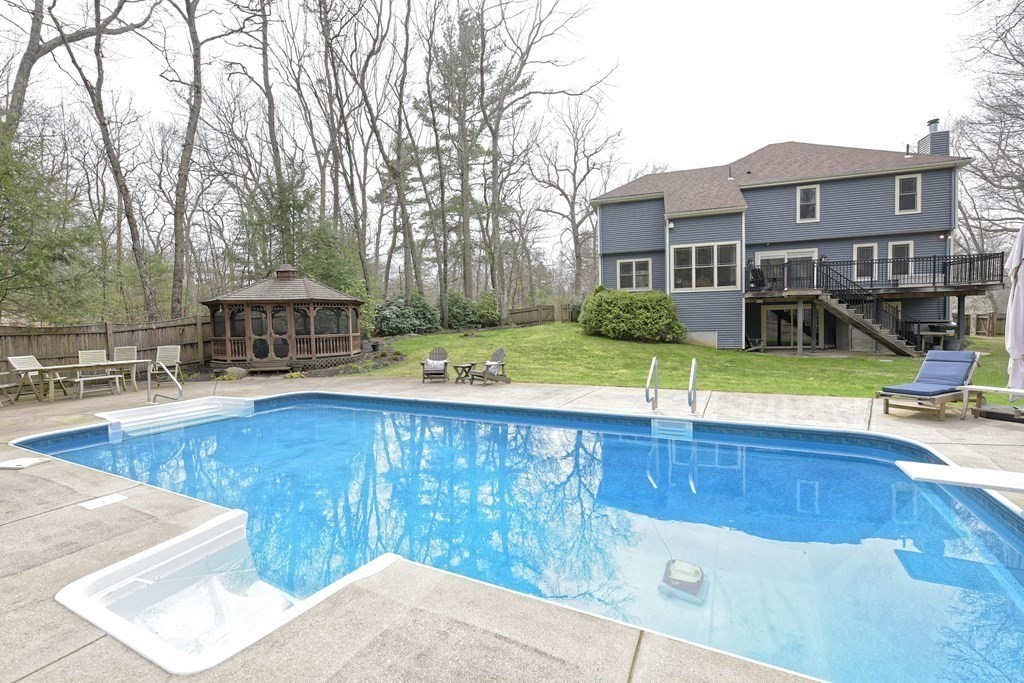 125 Brookside Drive Uxbridge, MA 01569 - Photo 35 of 40 a view of a house with swimming pool