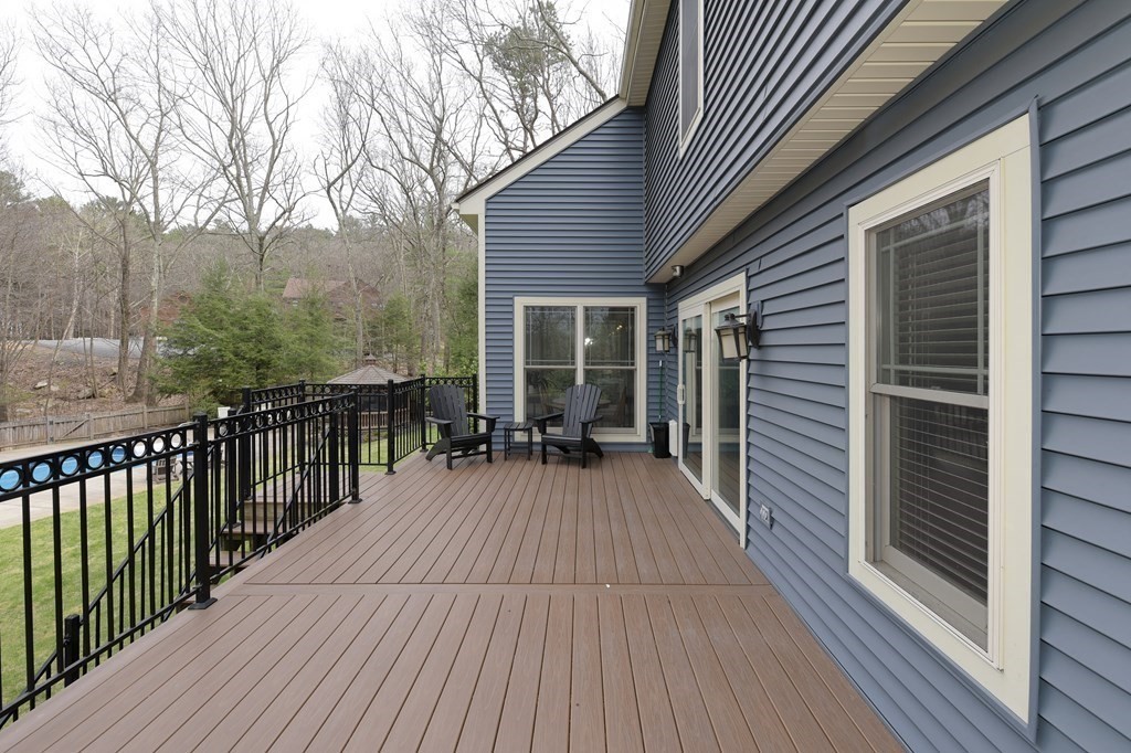 125 Brookside Drive Uxbridge, MA 01569 - Photo 38 of 40 a balcony with wooden floor