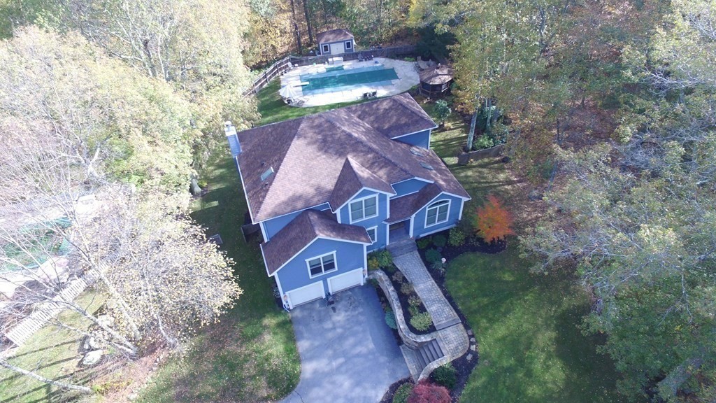 125 Brookside Drive Uxbridge, MA 01569 - Photo 5 of 40 a aerial view of a house with a yard