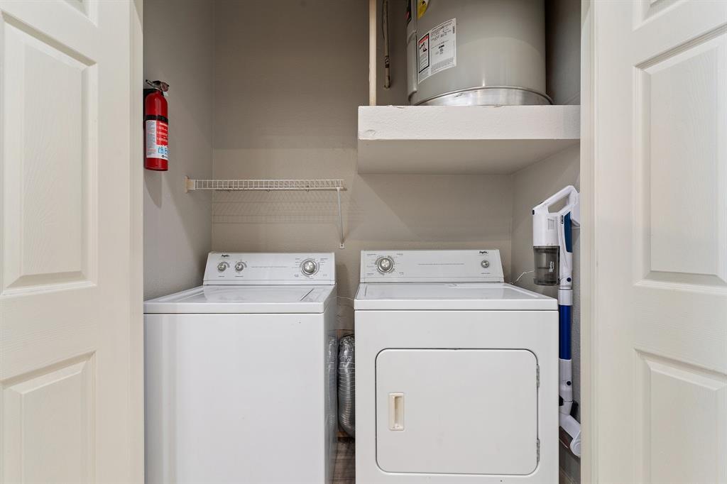 3102 Kings Road, Unit 1106 Dallas, TX 75219 - Photo 17 of 20 a utility room with dryer and washer