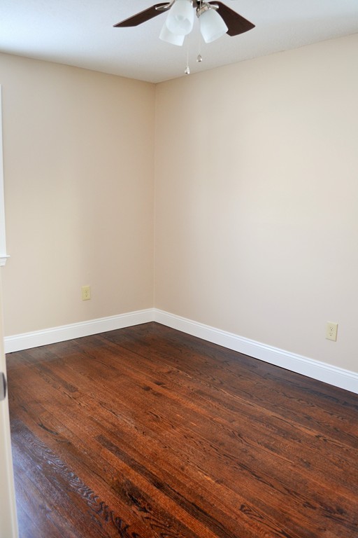 29 East Hill Road Springfield, MA 01109 - Photo 13 of 19 a view of an empty room with wooden floor