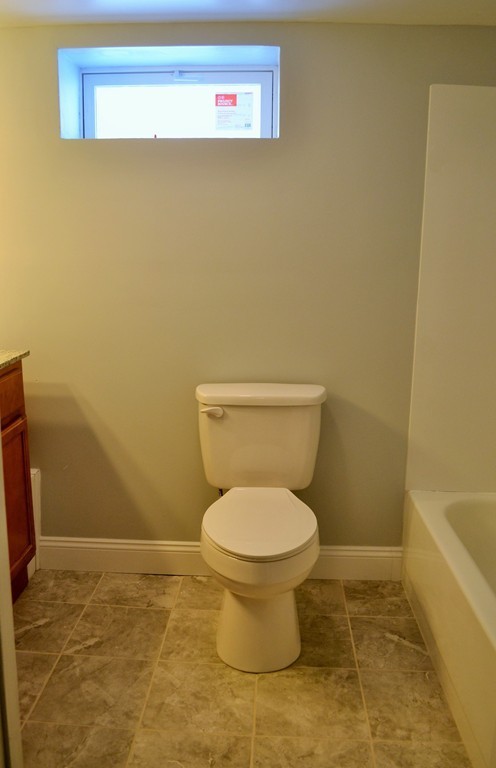 29 East Hill Road Springfield, MA 01109 - Photo 15 of 19 a bathroom with a toilet and a sink