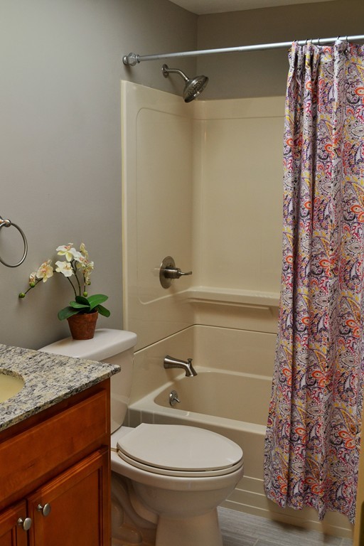 29 East Hill Road Springfield, MA 01109 - Photo 16 of 19 a bathroom with a sink a toilet and shower