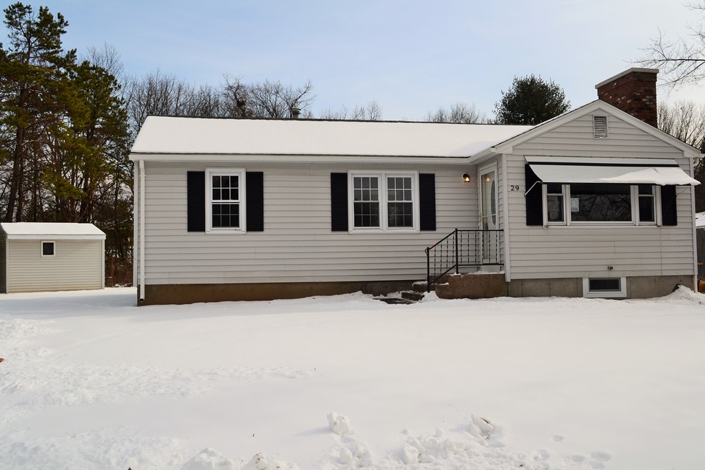 29 East Hill Road Springfield, MA 01109 - Photo 2 of 19 a view of a house with snow on the road