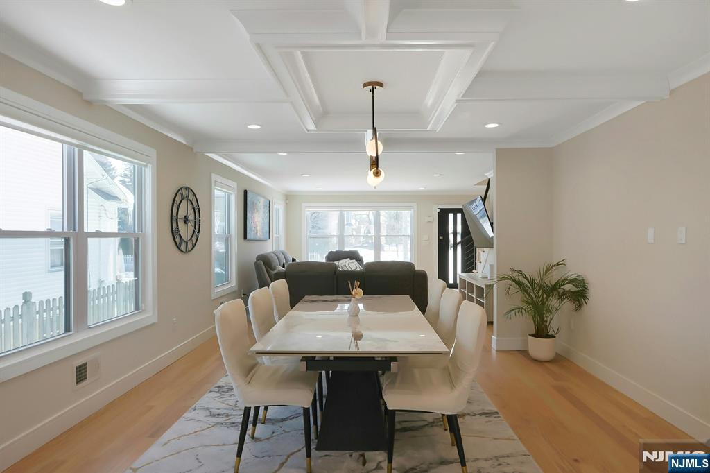 676 Ridgewood Avenue Oradell, NJ 07649 - Photo 11 of 47 a view of a dining room with furniture window and wooden floor