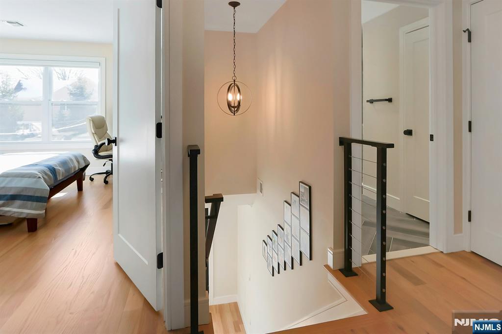 676 Ridgewood Avenue Oradell, NJ 07649 - Photo 25 of 47 a view of a bedroom with furniture and window