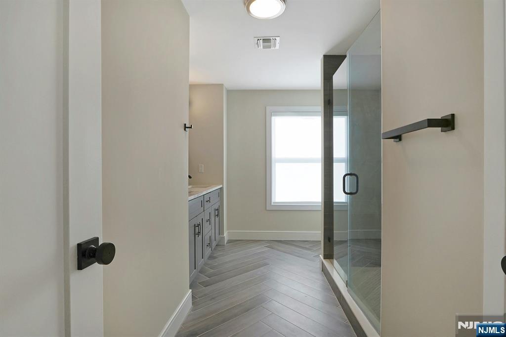 676 Ridgewood Avenue Oradell, NJ 07649 - Photo 34 of 47 a view of a bathroom with a shower