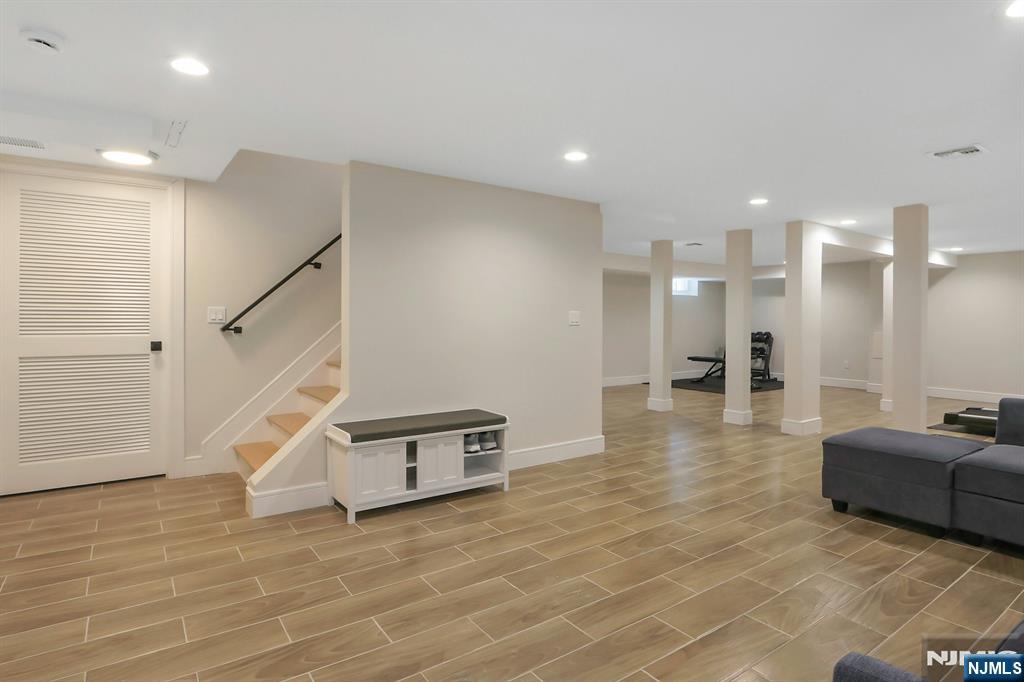 676 Ridgewood Avenue Oradell, NJ 07649 - Photo 39 of 47 a view of a living room with furniture and a ceiling fan