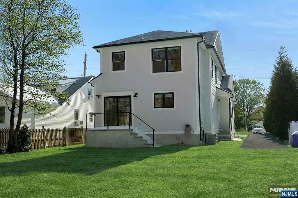 676 Ridgewood Avenue Oradell, NJ 07649 - Photo 44 of 47 a front view of house with yard