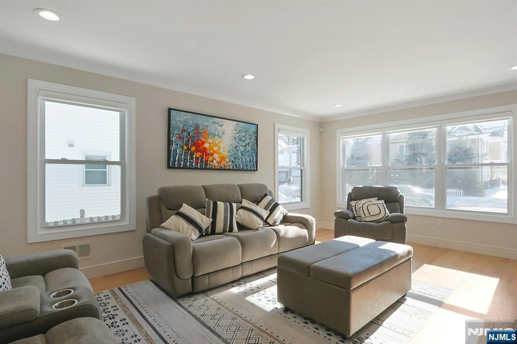 676 Ridgewood Avenue Oradell, NJ 07649 - Photo 8 of 47 a living room with furniture and a window