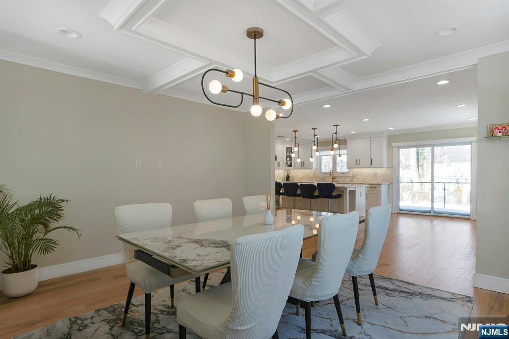 676 Ridgewood Avenue Oradell, NJ 07649 - Photo 9 of 47 a view of a dining room with furniture window and wooden floor
