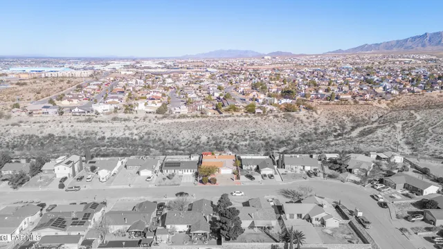 a bedroom with furniture and a flat screen tv