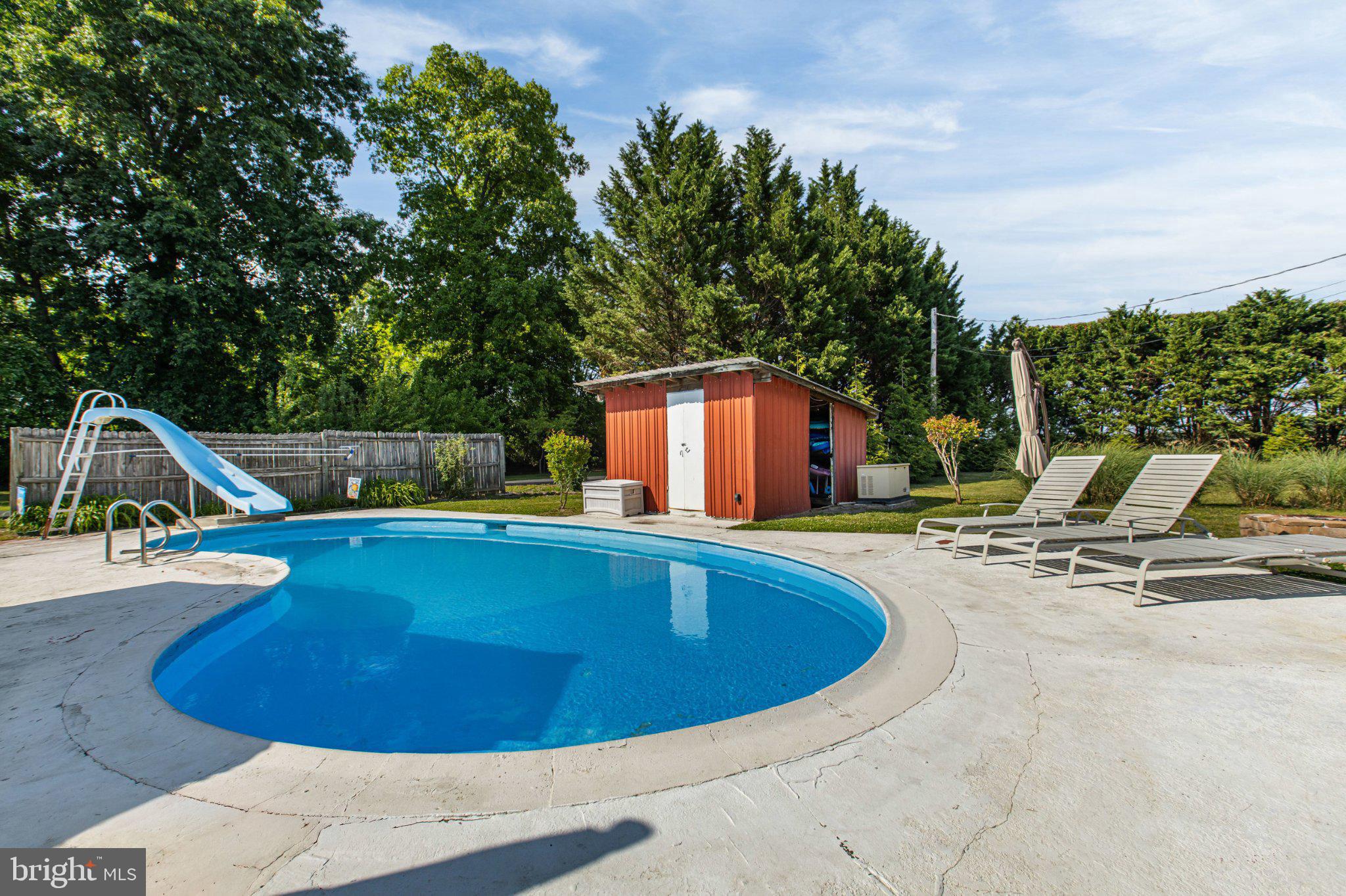 310 Dogtown Road Townsend, DE 19734 - Photo 28 of 43 Sunny oasis with inviting poolside.