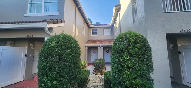 a house view with a garden space