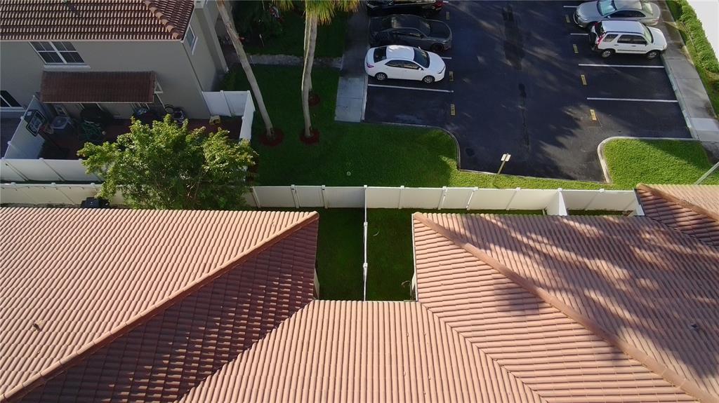 12606 Southwest 53rd Street Miramar, FL 33027 - Photo 3 of 13 a view of a wooden deck with couches and potted plants