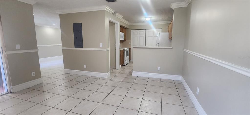 12606 Southwest 53rd Street Miramar, FL 33027 - Photo 5 of 13 an empty room with windows