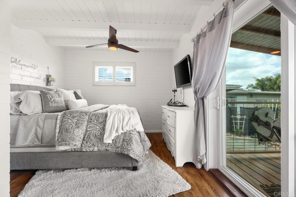 812 Sharon Way El Cajon, CA 92020 - Photo 20 of 65 a bedroom with a bed outdoor view mirror and window